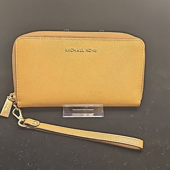Michael Korstan clutch wristlet